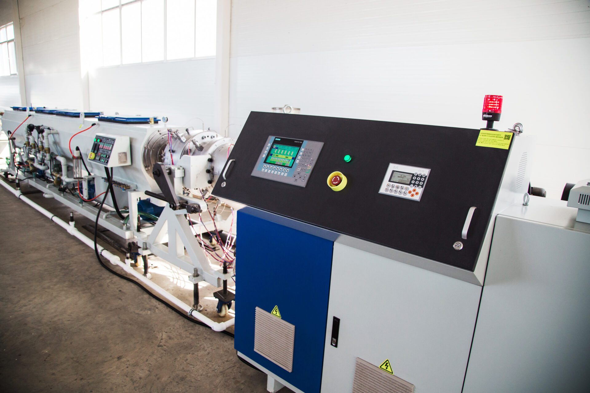 Polyurethane foam pipes production. HDPE pipe. High speed extrusion line of water suppply and gas pipe. Manufacturing facility. Automated production facility machine.